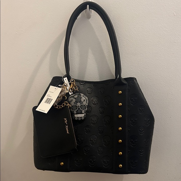 Betsey Johnson Handbags - Betsey Johnson Black Skull-Embossed Tote Bag with Charm